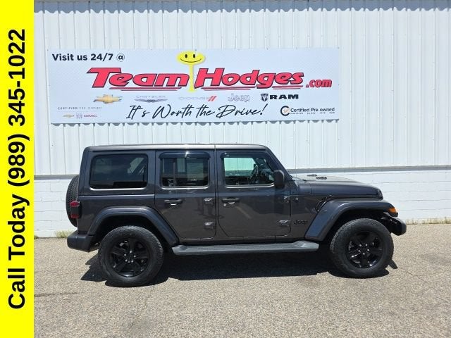 2021 Jeep Wrangler Unlimited Sahara in None — front three-quarter view