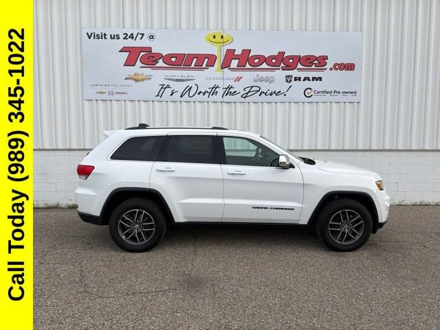 2018 Jeep Grand Cherokee Limited in White — front three-quarter view