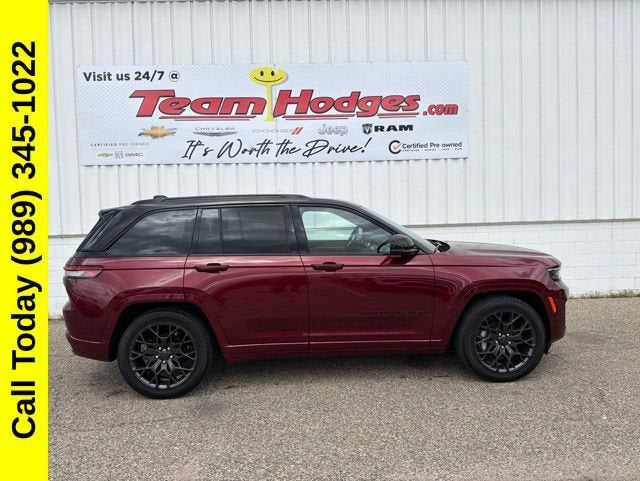 2024 Jeep Grand Cherokee Summit Reserve in Red — front three-quarter view