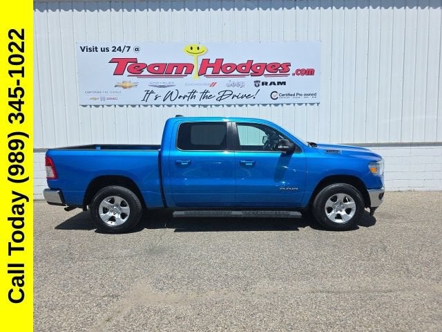 2022 RAM 1500 Big Horn in Blue — front three-quarter view