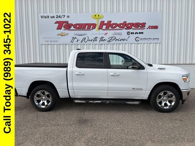 2021 RAM 1500 Big Horn in White — front three-quarter view