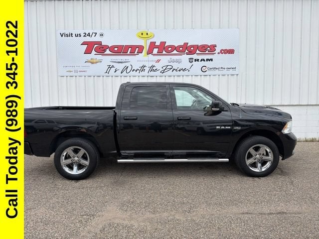 2010 Dodge Ram 1500 Sport in Black — front three-quarter view