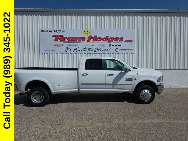 2016 RAM 3500 Laramie in White — front three-quarter view