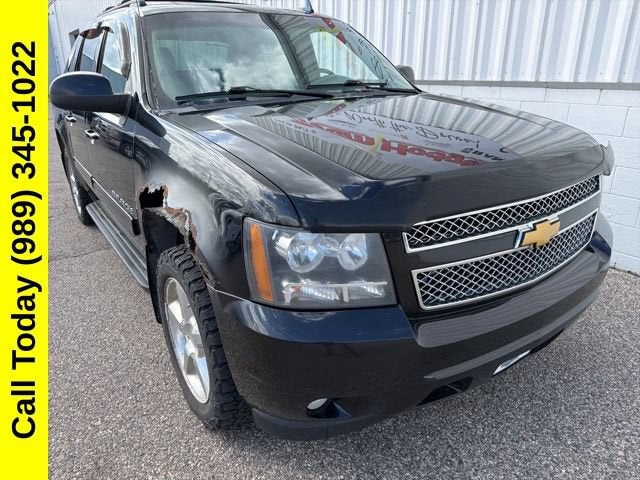 2013 Chevrolet Avalanche LT in Black — front three-quarter view